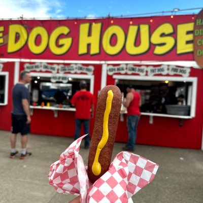 Hot dog in front of stand at the state fair
