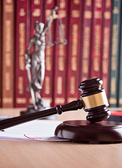 gavel with books and scales of justice