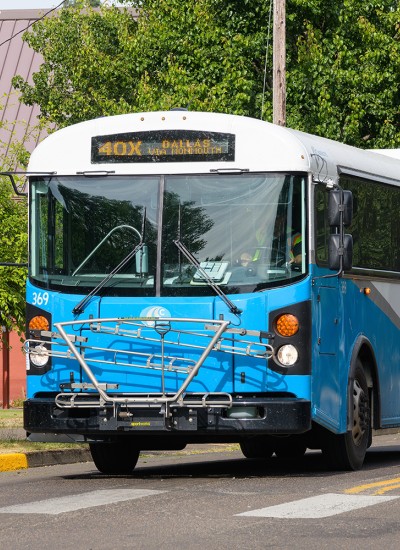 A Cherriots bus on street with a crosswalk