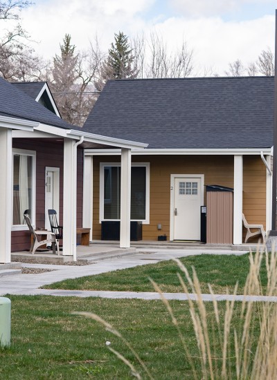A ground-level shot of the La Grande cottage cluster, with shared green space