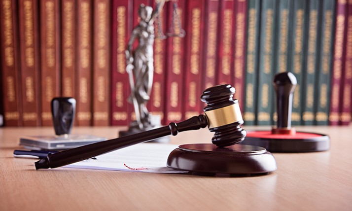 gavel with books and scales of justice