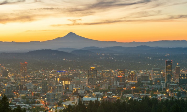 View of Portland, Oregon at dawn with Mt Hood and sunrise in the background