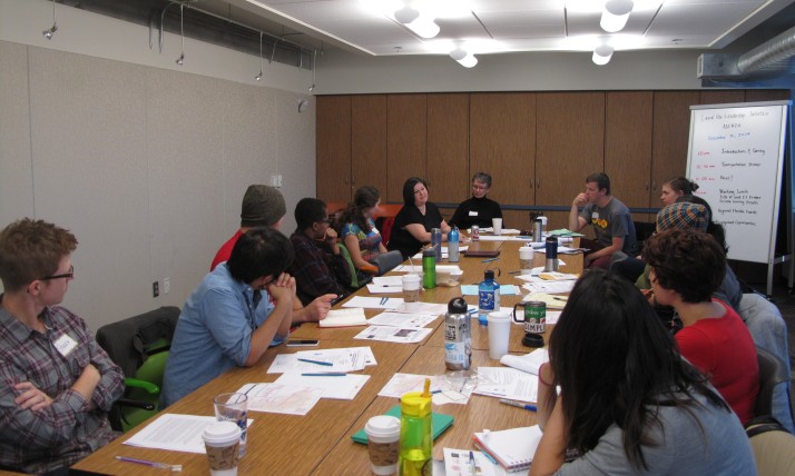 LULI cohort training at a large conference table