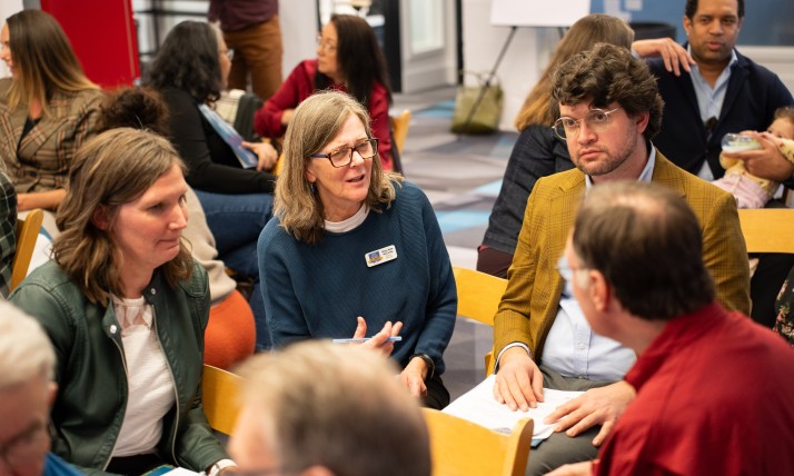 Mary Kyle McCurdy discussing in group at the strategic plan retreat