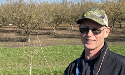 Photo of Dan Keeley in an orchard