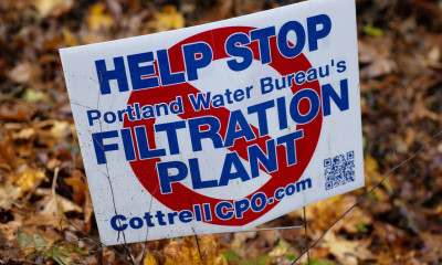 Lawn sign that says "Help stop Portland Water Bureau's Filtration Plant. CottrellCPO.com